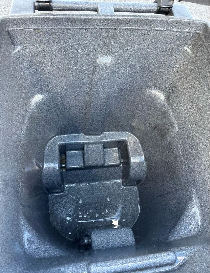 The same cart after cleaning, with the staining and label lifted away