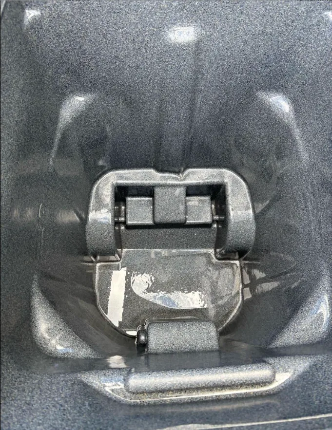 The same grey cart rinsed clean, with the dried residue removed from the base